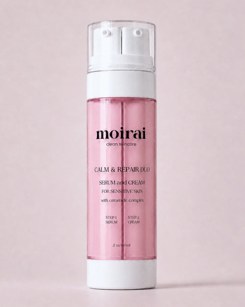 Moirai Calm & Repair Duo serum and cream for sensitive skin in dual-chamber bottle on a soft pink background