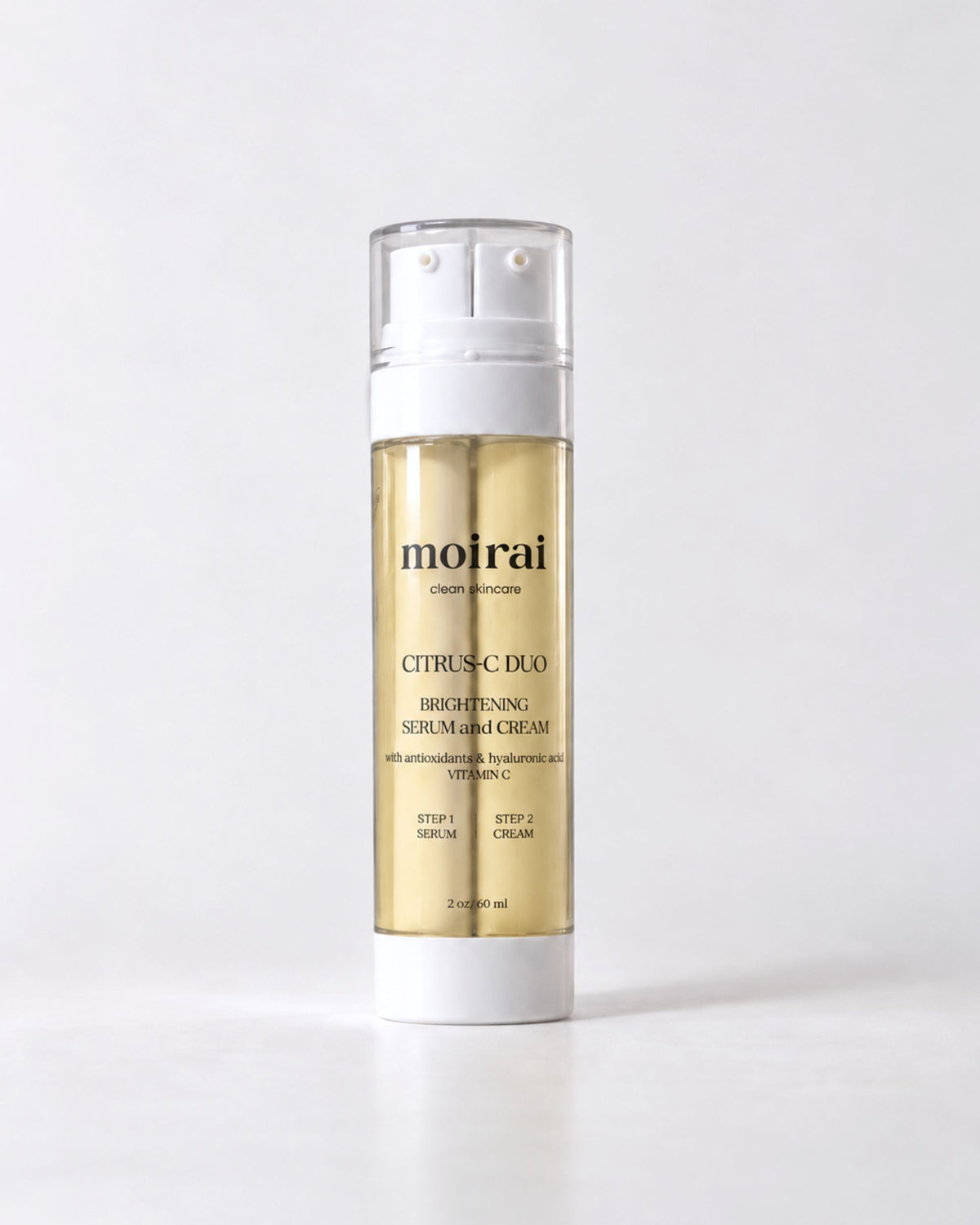 Moirai Citrus-C Duo Brightening Serum and Cream dual-chamber skincare bottle with vitamin C on a light gray background