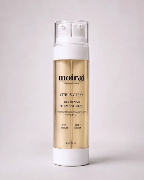 Moirai Citrus C Duo brightening dual-delivery serum and cream bottle with vitamin C and antioxidants on a light gray background