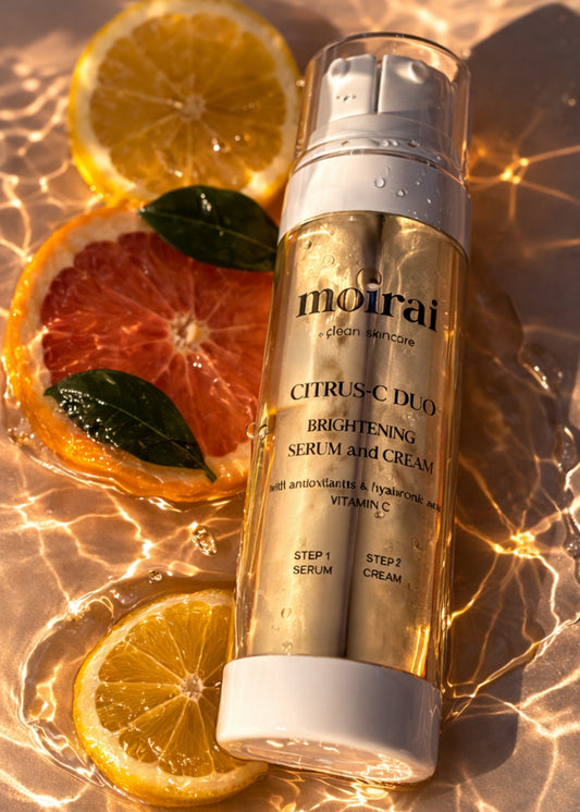 Moirai Citrus-C Duo dual-delivery Vitamin C serum and cream with citrus slices and water reflections for radiant glowing skin