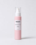 A bottle of Moirai Gentle Cleanser with Coconut Milk & Honey for sensitive skin, featuring a light pink bottle, white pump dispenser, and clear cap, set against a clean light gray background