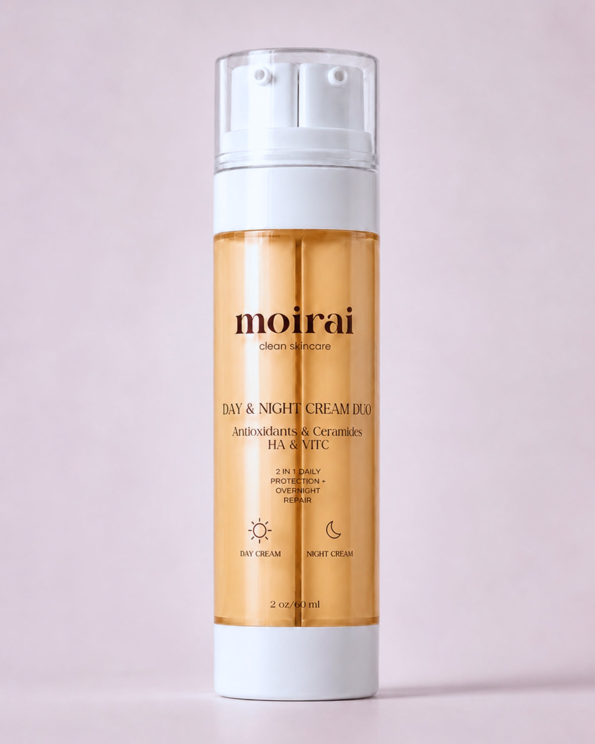 Moirai Day & Night Cream Duo with antioxidants, ceramides, hyaluronic acid and vitamin C in an orange dual-chamber skincare bottle on a soft pink background