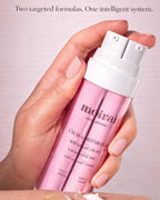 Moirai Calm & Repair Duo dual delivery serum and cream for sensitive skin shown in hand with dual pump bottle
