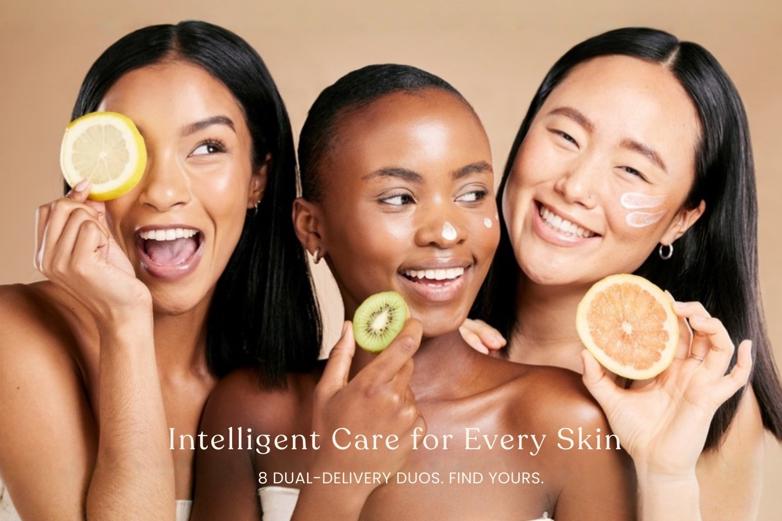 Diverse women representing different skin types with natural fruit imagery, highlighting Moirai dual-delivery skincare designed for every skin.