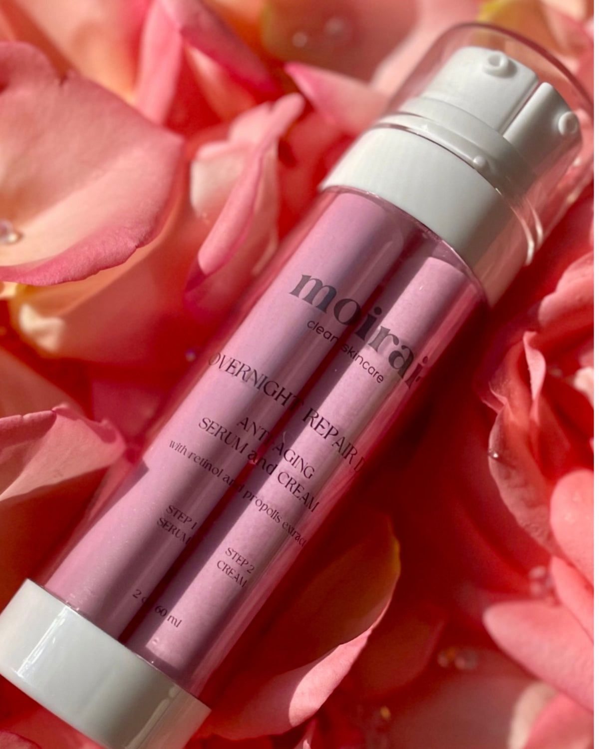 Moirai Overnight Repair Duo anti aging dual delivery serum and cream with retinol over rose petals
