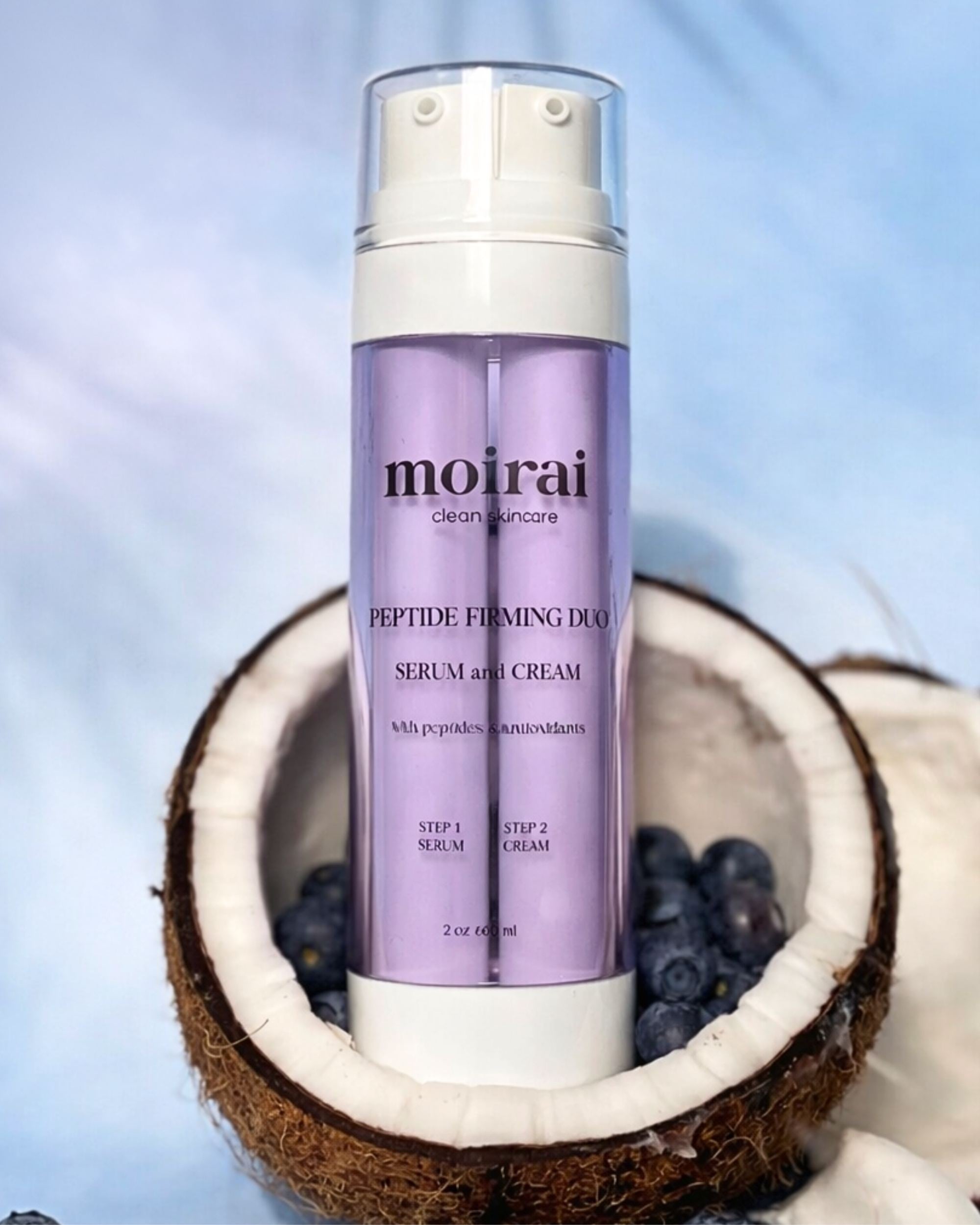 Moirai Peptide Firming Duo serum and cream with peptides for firmer looking skin on coconut and blueberry background