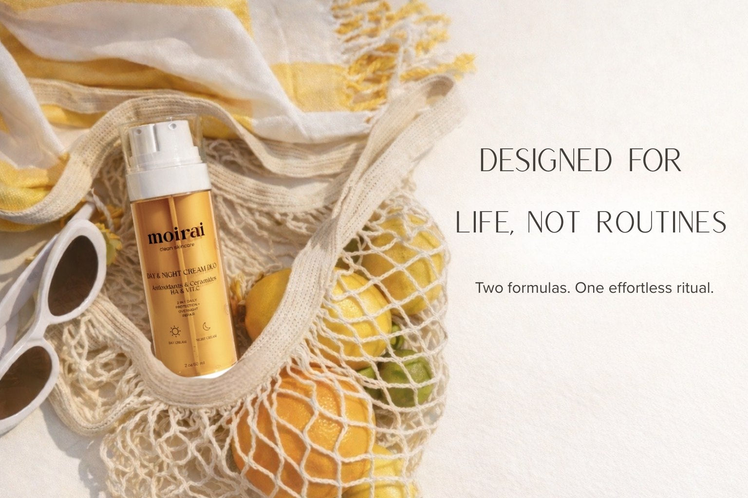 Moirai dual delivery skincare bottle in a lifestyle setting, showing serum and cream in one bottle for simplified routine