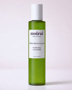 Moirai Willow Bark & Lavender Purifying Cleanser green bottle on light background 