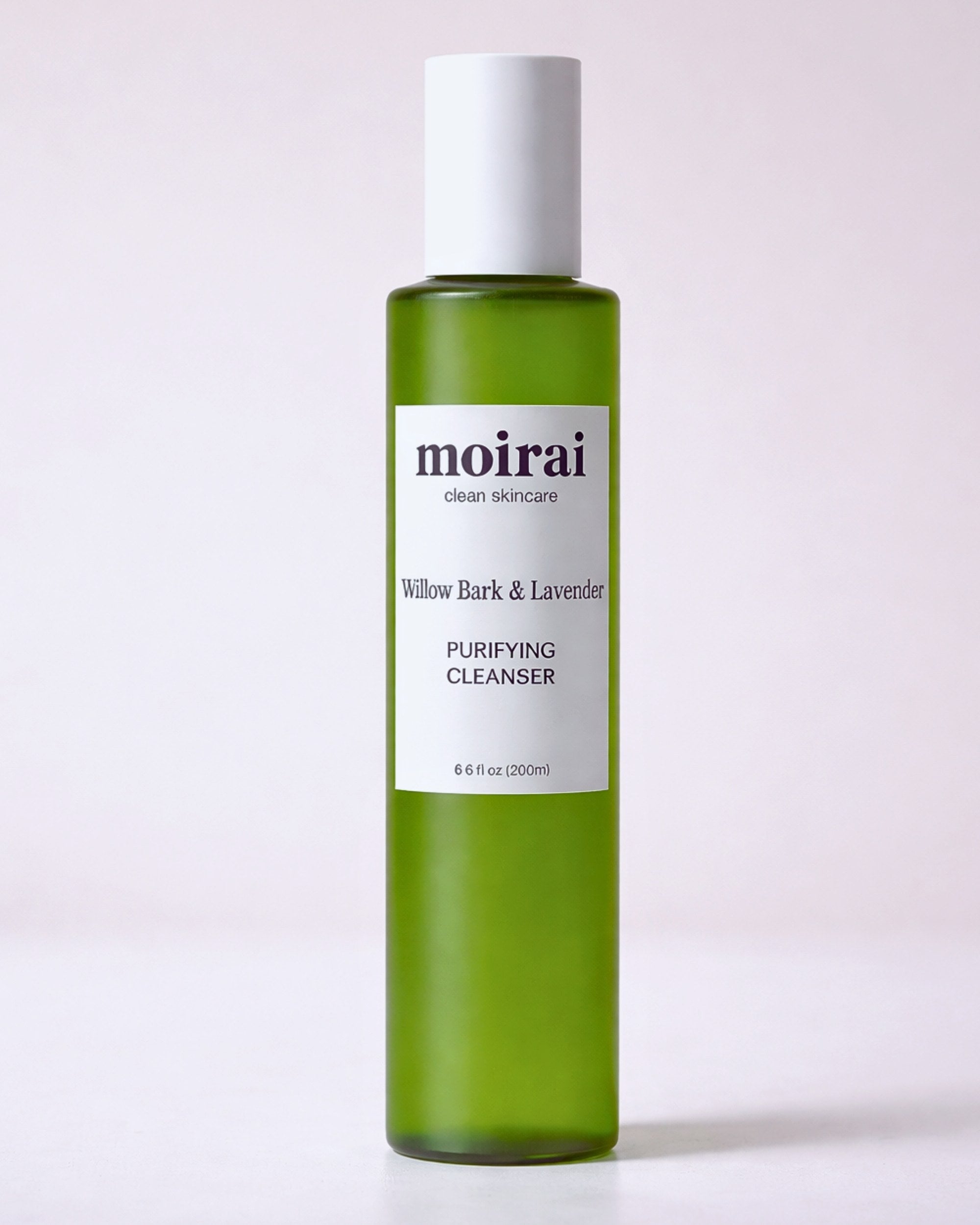 Moirai Willow Bark & Lavender Purifying Cleanser green bottle on light background 